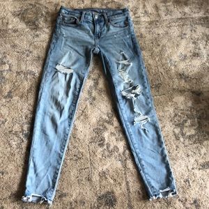 American Eagle: light washed, ripped jeggings.